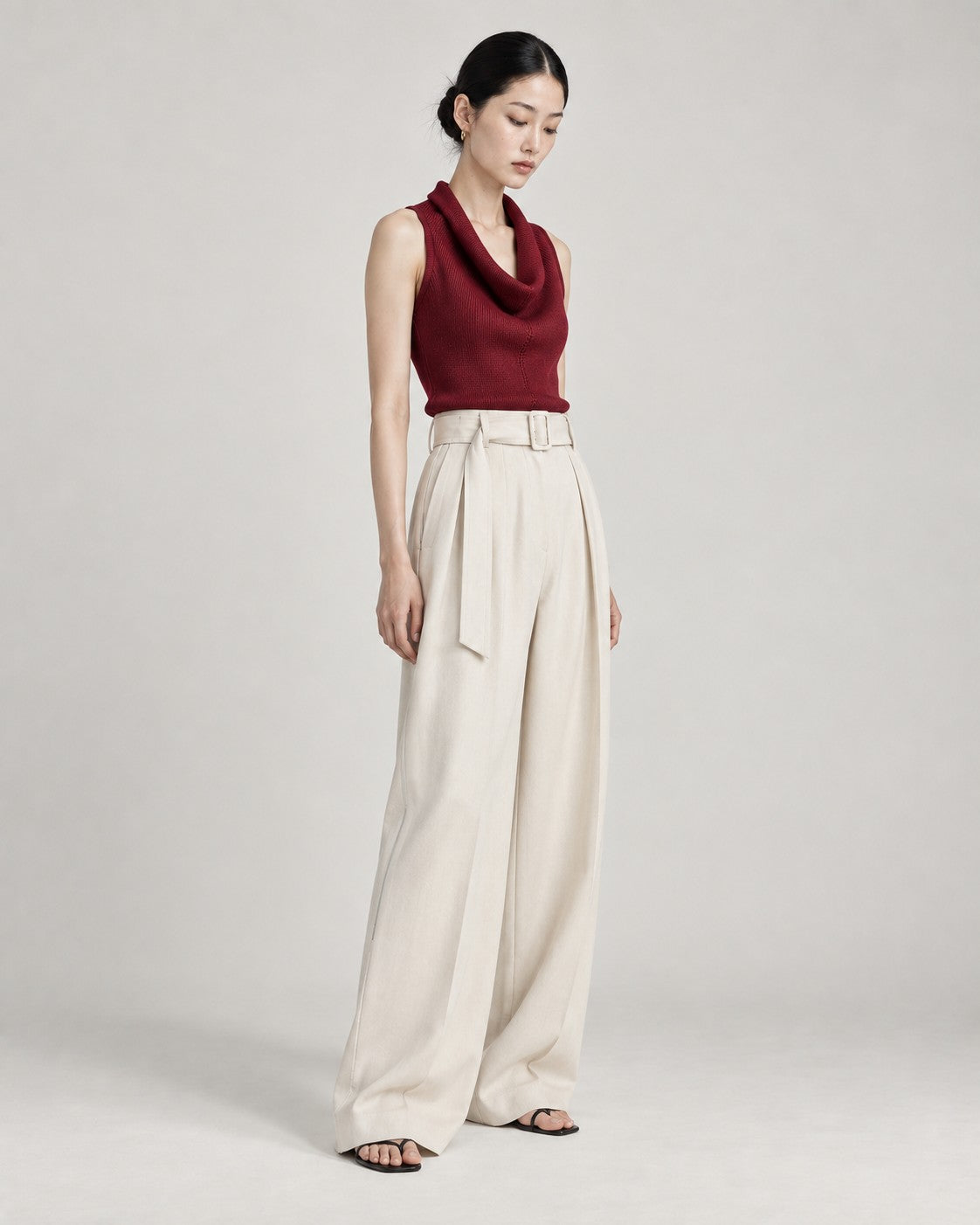 Red Knit, cream trousers